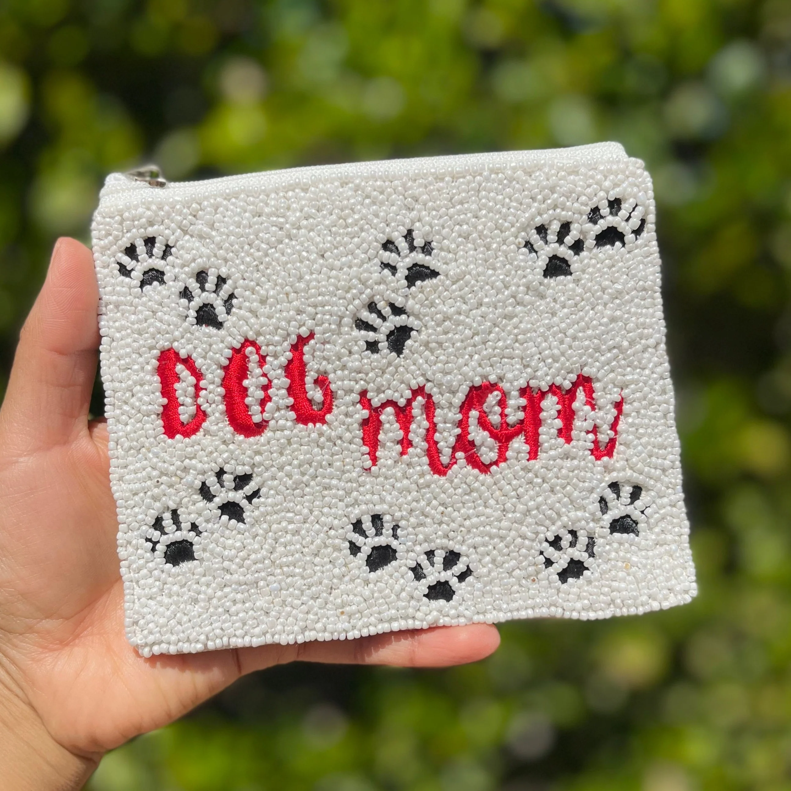 What kind of beads are used on the coin purse?